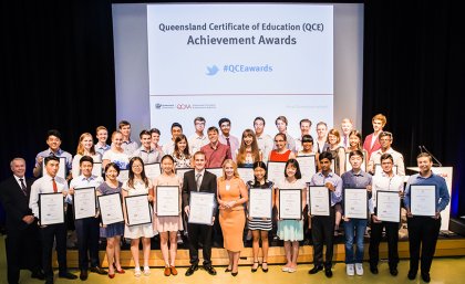 The QCE Achievement Award winners with the Hon Kate Jones (centre) and Brian Short, Chair of the QCAA Board (far left)